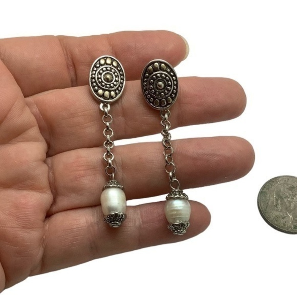 - Gold tone faux pearl dangle earrings